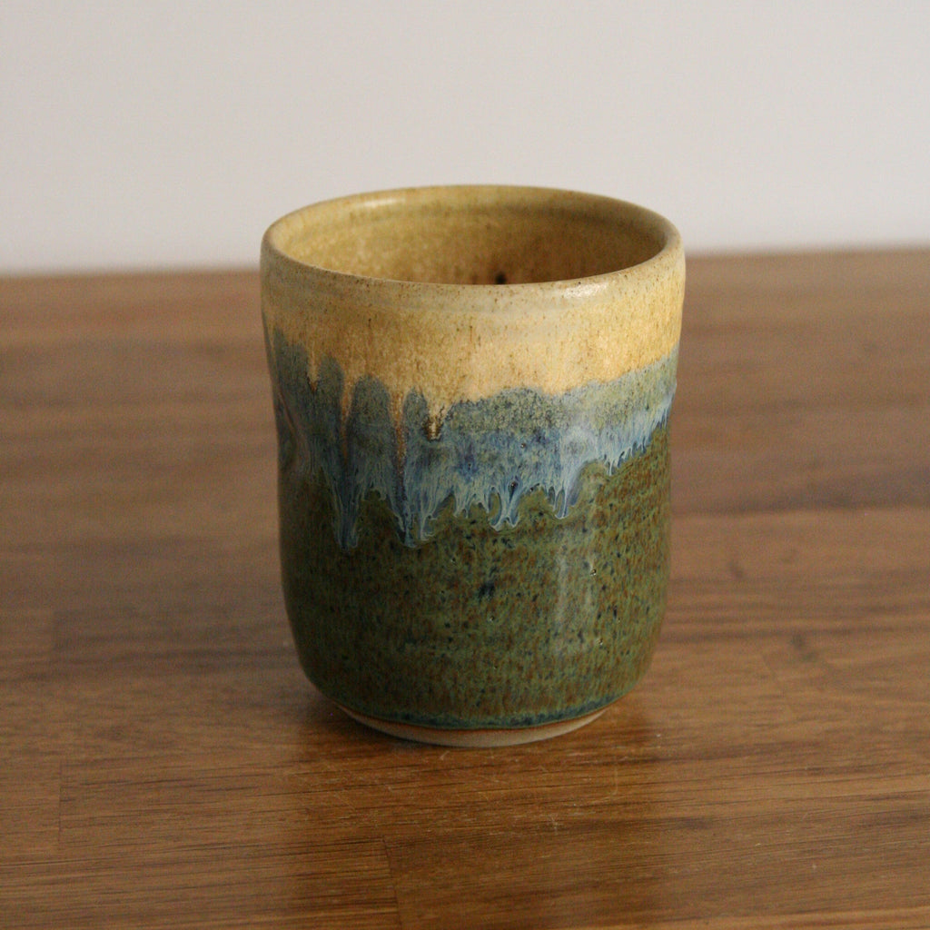 Handmade Rocky Hillside glaze thumb cup, thrown stoneware pottery by Emma Kathryn Pottery