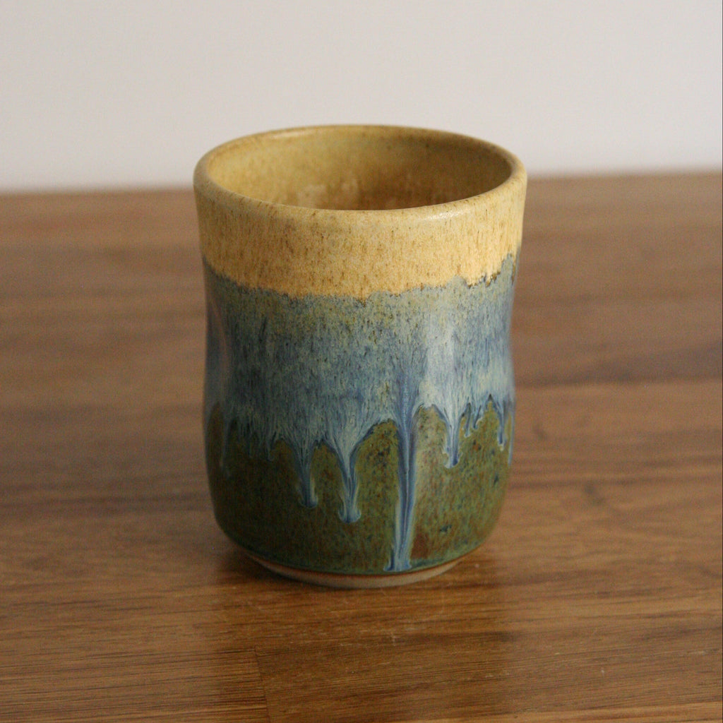 Handmade Rocky Hillside glaze thumb cup, thrown stoneware pottery by Emma Kathryn Pottery