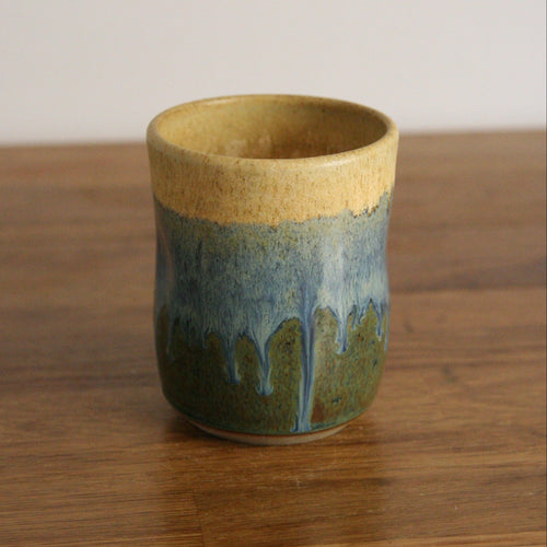 Handmade Rocky Hillside glaze thumb cup, thrown stoneware pottery by Emma Kathryn Pottery